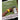 Close up image of SKLZ Hyper Speed on wrist with phone showing APP on field background with overlay text highlighting train anytime
