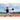 Action shot of male with ball in hand after fielding with SKLZ Fielding Hands youth trainer at field
