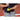 SKLZ 12 ounce Hitter Handle being adjusted by batter in uniform