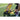 Action shot from behind the SKLZ soccer trainer board of male kicking ball towards board at a field